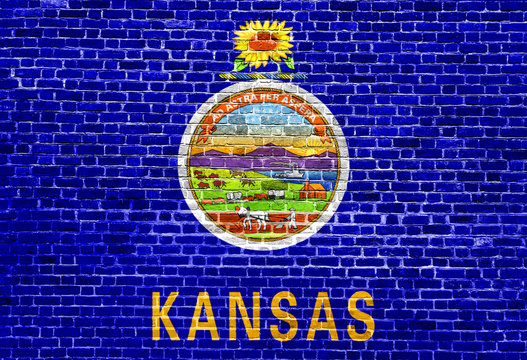 Kansas US flag painted on old vintage brick wall