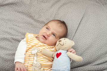 Babyboy newborn looking up