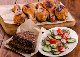 Chicken legs  with fresh  salad