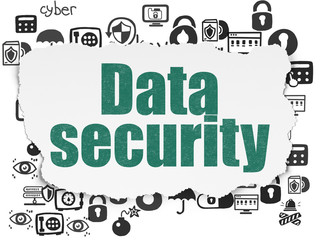 Protection concept: Data Security on Torn Paper background