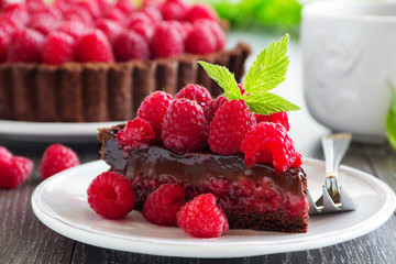 Chocolate tart with fresh raspberries.
