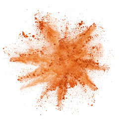 Explosion of orange powder on white background