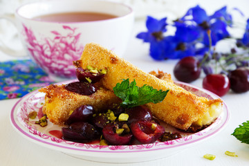 Fried brie with Cherry Sauce.