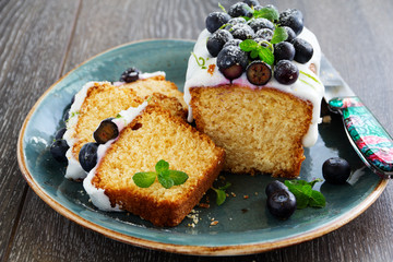 Lemon cake with blueberry glaze.