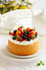 Chiffon cake with summer berries and cream.