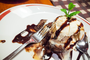 Molten chocolate cake with ice cream and mint