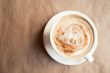 Cappuccino. Cup of coffee with milk, top view
