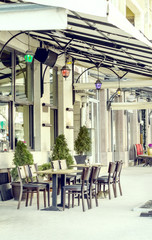 Empty coffee tables and chairs on the street in Varna, Bulgaria