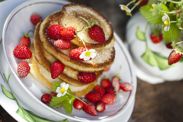 Pancakes with fresh strawberries