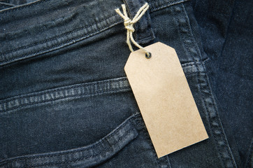 Close up of fashion jeans and lable tag