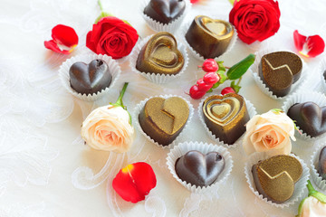 chocolates in a heart shape made of milk and dark chocolate with