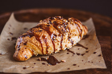 Croissant with chocolate topping 