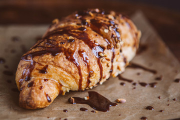 Croissant with chocolate topping 