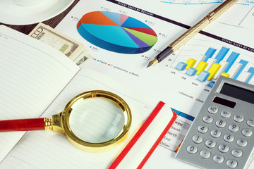 Financial charts and graphs on the table