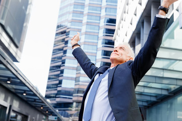 Portrait of confident businessman outdoors