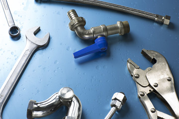 set of plumber tools / overhead of an essential tool kit for plumber