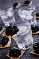 Fototapeta na wymiar Black caviar on a cracker