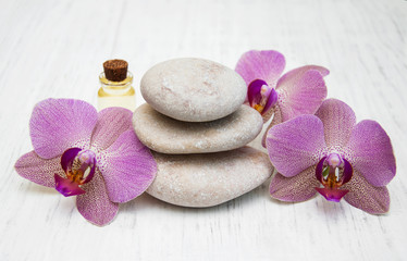 Obraz na płótnie Canvas Orchids and massage stones