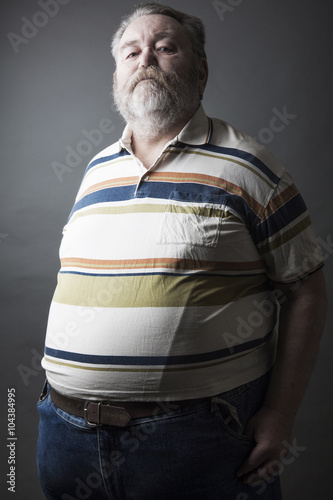 “Portrait of fat senior man with full beard” photo libre de droits sur