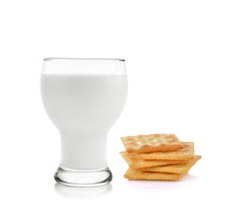 Fresh milk and cracker on white background