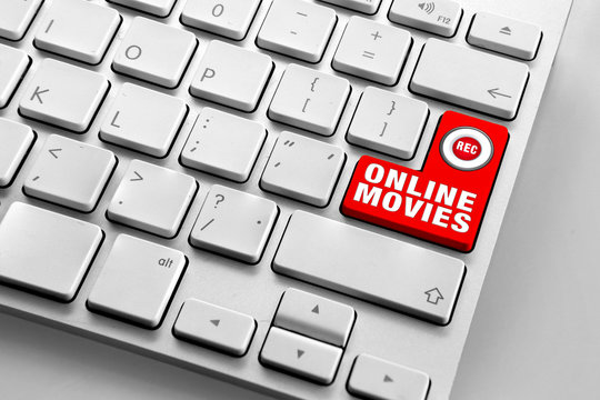 Computer keyboard with red online movies button
