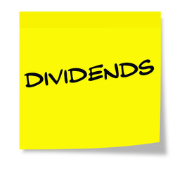 Dividends written on a yellow sticky note
