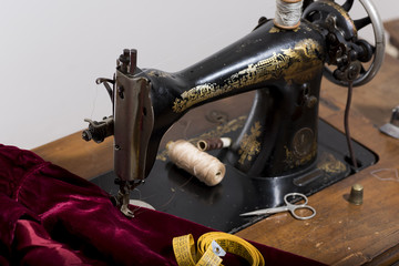 antique sewing machine in a study tailoring.