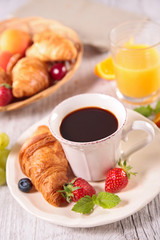 coffee cup and croissant