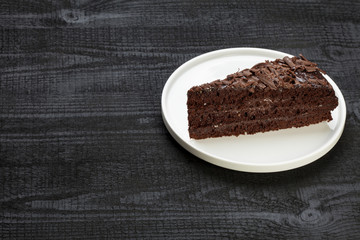 Piece of cake on the white plate