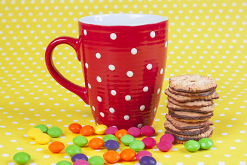 Candy with cup of coffee 
