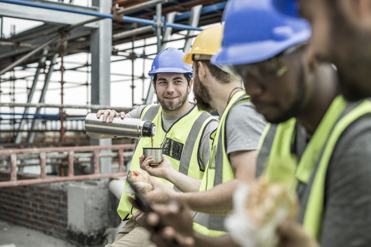 Construction workers having a break on construction site