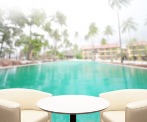 Wood Table Top of Background and Pool