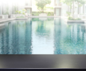 Obraz na płótnie Canvas Wood Table Top of Background and Pool