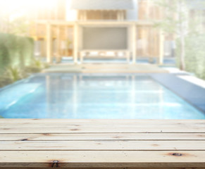 Wood Table Top of Background and Pool