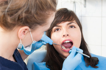 Patient with healthy teeth at dentist office