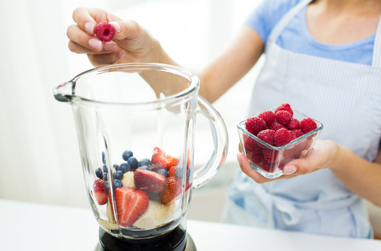 Fresh fruit smoothie made with electric blender generated by AI