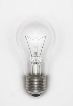 illuminated light bulb on white background