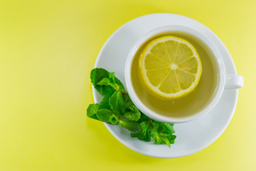 cup of tea with lemon and mint