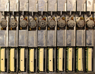 Many old retro floppy drives from laptop computers. Stepper motors and interface connectors.
