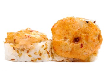 Pair of baked japanese rolls with spicy cheese isolated
