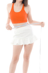 young woman measuring waist on white background