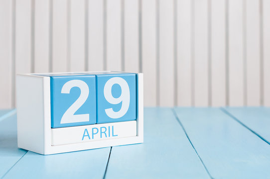 April 29th. Image of april 29 wooden color calendar on white background.  Spring day, empty space for text. International or World Dance Day
