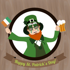 Green Leprechaun with beer and  Irish flag celebrating Saint Patricks Day on the wooden background