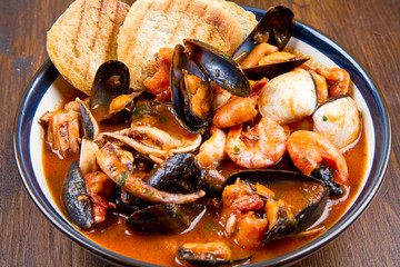 fresh seafood soup with roasted bread