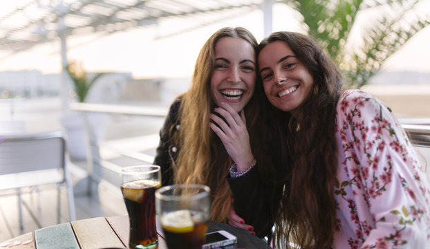 Portrait of two female friends having fun together