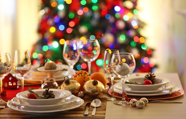 Christmas table setting with holiday decorations