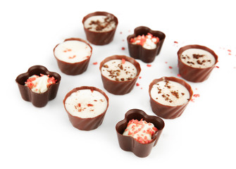 Assorted chocolate candies, isolated on white