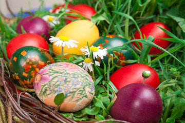Fototapeta na wymiar Colorful Easter eggs in basket.
