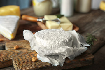 Set of cheese on wooden background