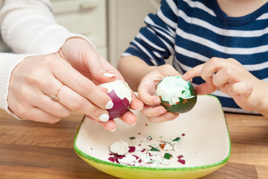 Peeling Easter eggs.